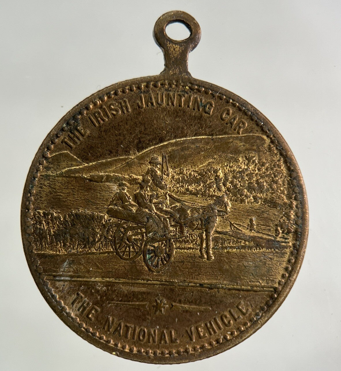 An Irish Spinning Wheel & Jaunting Car Medal Coin | Collectable Grade
