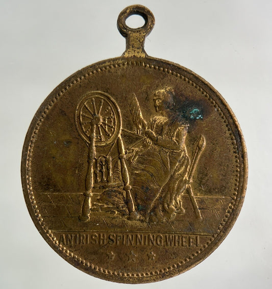 An Irish Spinning Wheel & Jaunting Car Medal Coin | Collectable Grade