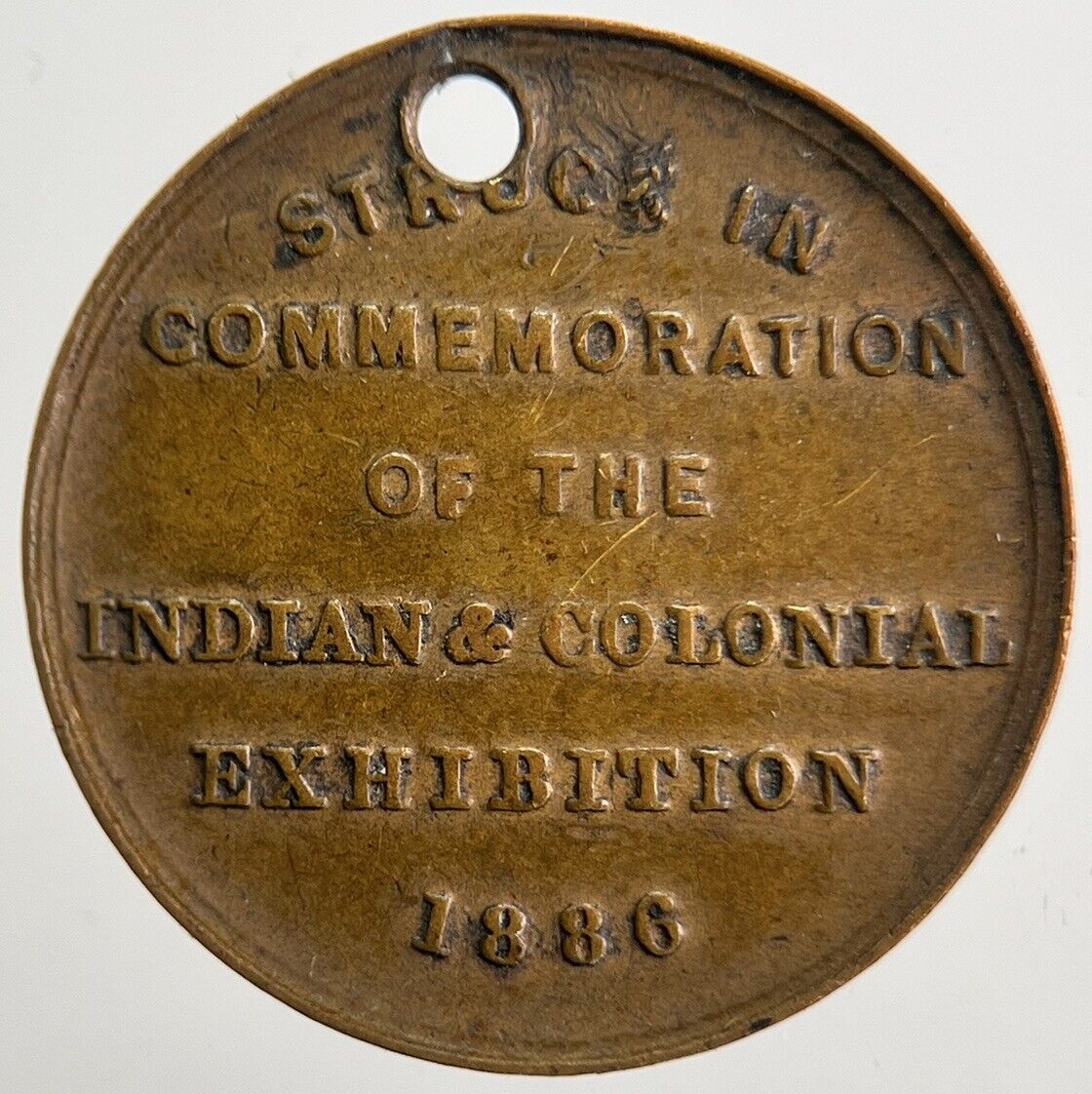 1886 British India & Colonial Exhibition Coin | Fine Collectable Grade | a5361